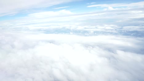 Traveling-by-air-above-clouds.-View-through-an-airplane-window