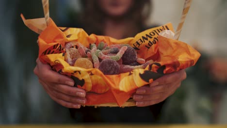 Halloween.-Close-up-of-sweets-in-a-basket