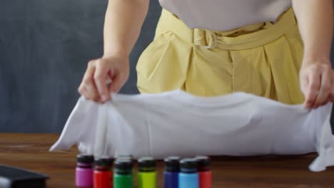 Unrecognizable-Woman-Preparing-to-Paint-T-Shirt