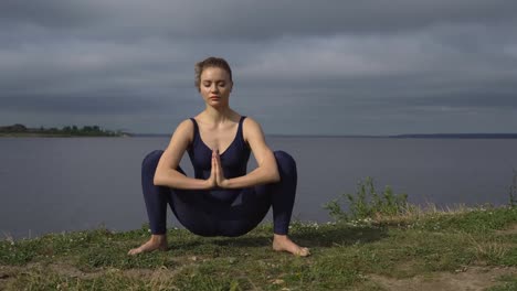 Woman-in-classical-yoga-pose,-energy-concentration