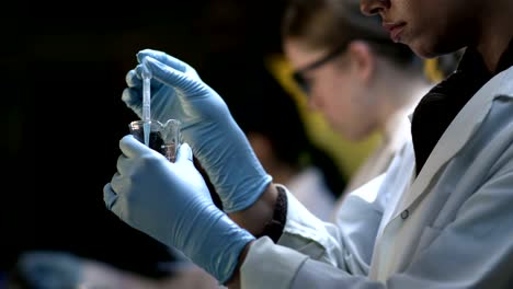 Close-up-of-experiments-being-conducted-in-a-chemistry-lab