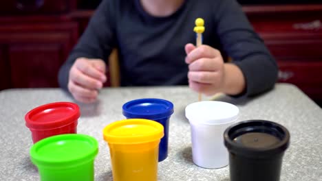 A-child-playing-with-clay.