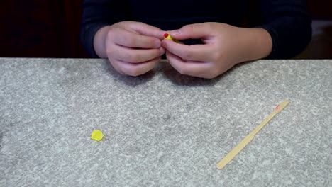 A-child-playing-with-clay.