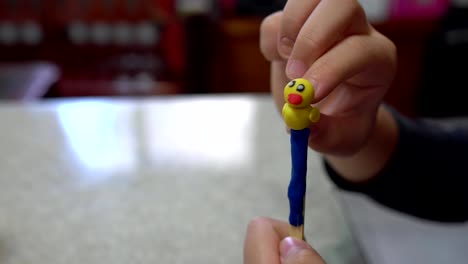 A-child-playing-with-clay.