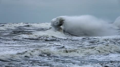 High-wave-breaking-on-the-rocks-of-the-coastline.-Extremely-Big-Wave-crushing-coast-,-Large-Ocean-Beautiful-Wave.-Super-Slow-Motion.