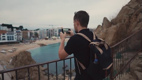 Kerl-schießen-Strand-von-Uphigh.