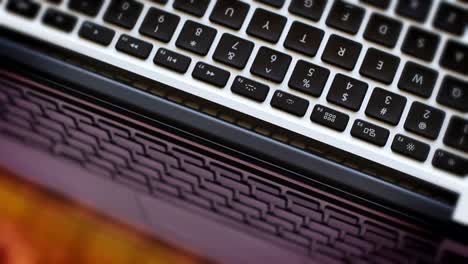 Rotating-Laptop-Keyboard-and-Reflections-on-the-Screen