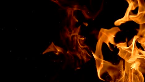 Flames-of-fire-on-black-background-in-slow-motion