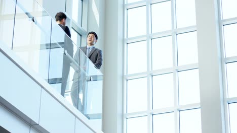 Male-multi-ethnic-business-team-in-corporate-meeting