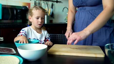 Mother-Cutting-Olives-with-Daughter