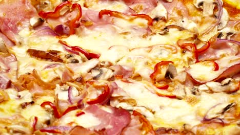 Rustic-italian-pizza-with-ham,-kaiser,-mozzarella-and-mushrooms