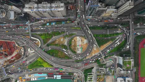 day-time-city-downtown-bay-traffic-road-junction-victoria-harbour-aerial-topdown-panorama-4k-hong-kong