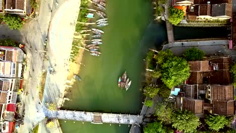 upper-view-channel-waterfront-and-old-Hoian-colorful-roofs