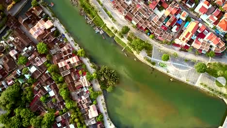 green-river-washes-ancient-Hoian-embankments