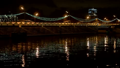 View-from-the-deck-of-the-ship,-which-floats-on-the-River,-along-the-waterfront-decorated-for-the-holiday.