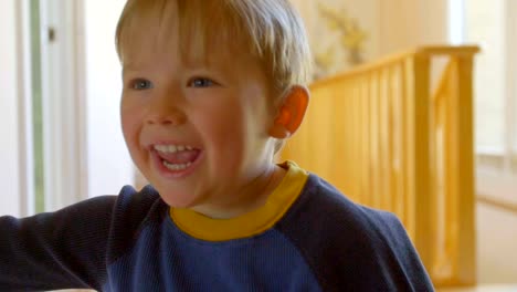 close-up-of-cute-kid-making-fake-smile