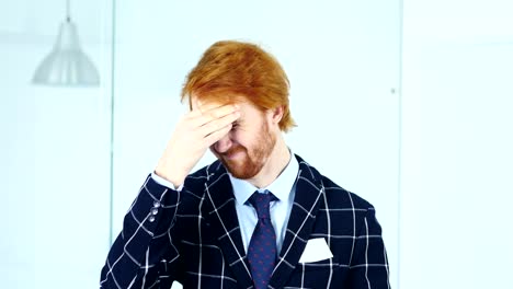 Headache,-Upset-Tense-Young-Redhead-Businessman