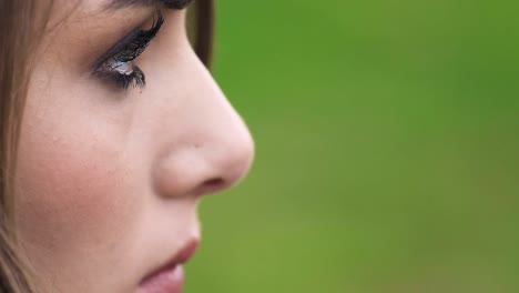 Profile-of-sad,-pensive-beautiful-young-woman,-close-up