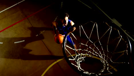 Male-basketball-player-playing-in-the-court-4k