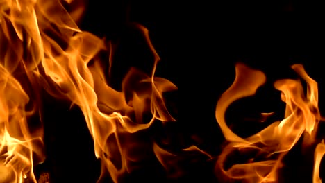 Flames-of-fire-on-black-background-in-slow-motion