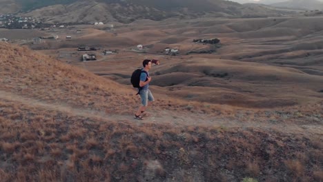 Man-traveling-with-backpack