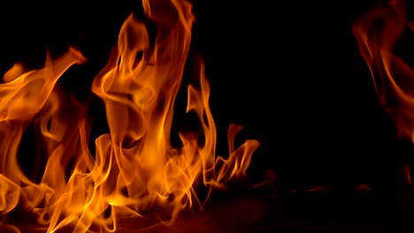 Flames-of-fire-on-black-background-in-slow-motion