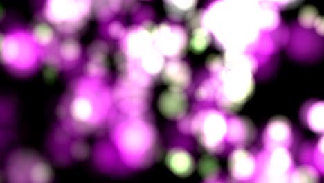 Fondo-abstracto-con-animación-que-brilla-intensamente-púrpura-magenta-verde-blanco-bokeh