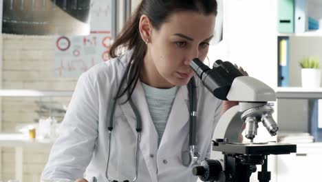 Woman-Taking-Notes-while-Studying-Samples