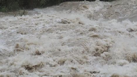 The-Serio-river-swollen-after-heavy-rains.-Province-of-Bergamo,-northern-Italy