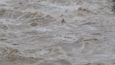 The-Serio-river-swollen-after-heavy-rains.-Province-of-Bergamo,-northern-Italy