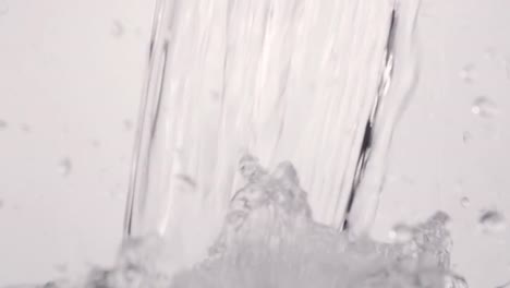 Crystal-Clear-Water-Pouring-Into-Glass-Slow-Motion