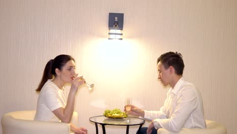 Romantic-rendezvous-of-a-man-and-a-woman-with-fruits-and-champagne