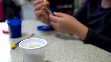 A-child-playing-with-clay.