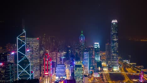 antena-centro-de-la-ciudad-iluminada-de-noche-timelapse-panorama-4k-hong-kong