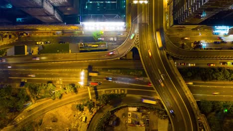 noche-iluminación-tráfico-carretera-cruce-aéreo-parte-superior-ve-timelapse-4k-hong-kong