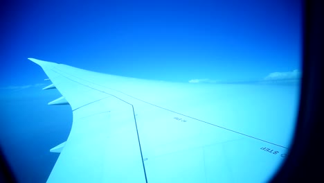 Wing-of-airplane-on-sky-and-cloud-on-moving