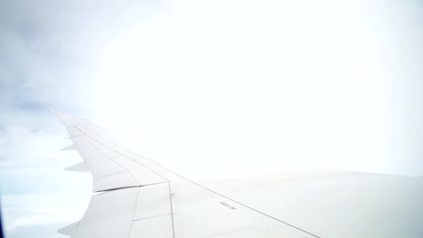 Wing-of-airplane-on-sky-and-cloud-on-moving