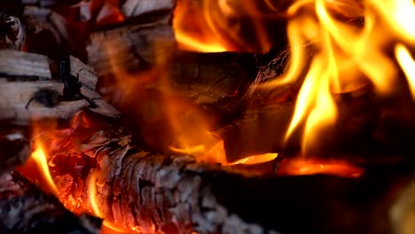 Flames-of-fire-on-black-background-in-slow-motion