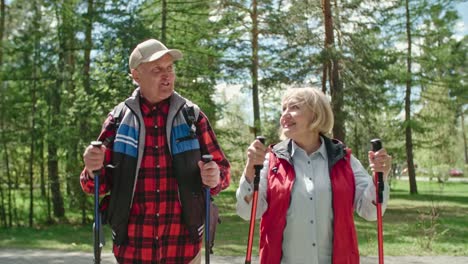 Laughing-Senior-Tourists-Enjoying-Walk