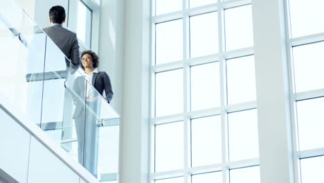 Male-female-multi-ethnic-business-team-meeting-office