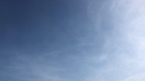 Beauty-clouds-against-a-blue-sky-background.-Cloudy-sky.-Blue-sky-with-clouds-weather,-nature-cloud.-White-clouds,-blue-sky-and-sun.