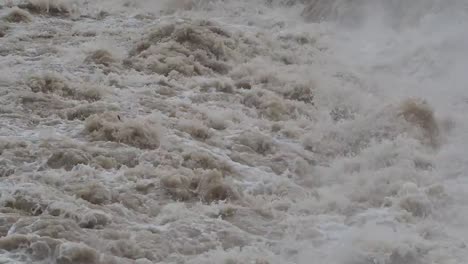 The-Serio-river-swollen-after-heavy-rains.-Province-of-Bergamo,-northern-Italy