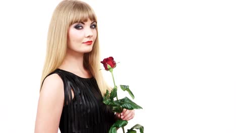 Woman-gorgeous-girl-dark-makeup-holds-rose-flower-4K