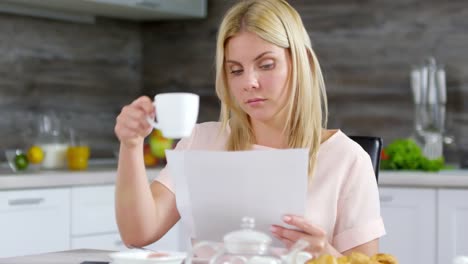 Caucasian-Woman-Working-with-Documents-from-Home