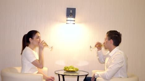 Romantic-rendezvous-of-a-man-and-a-woman-with-fruits-and-champagne