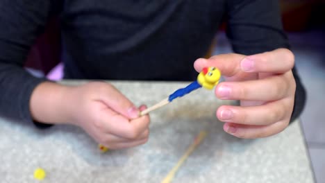 A-child-playing-with-clay.