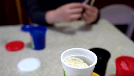 A-child-playing-with-clay.