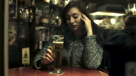 sad-sexy-woman-reflected-with-glass-of-beer
