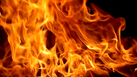 Flames-of-fire-on-black-background-in-slow-motion