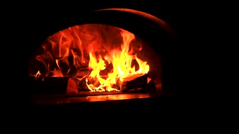 Beautiful-Fire-Close-Up-Slow-Motion.-Video-Clip-of-Burning-Firewood-in-the-Fireplace.-Firewood-Burn-in-the-wood-burning-stove.-30fps-Full-HD